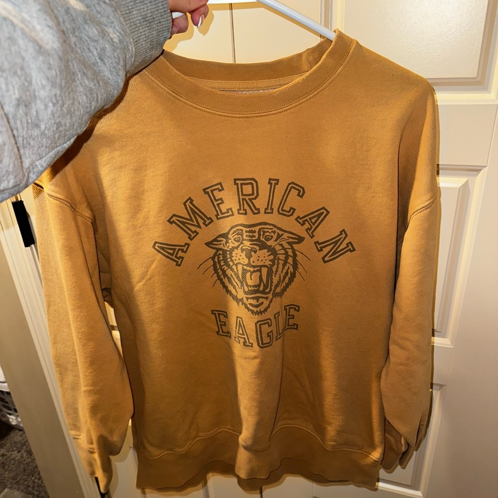 Women’s size small American eagle orange sweatshirt